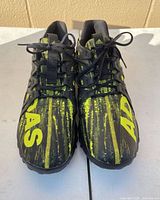 Top view of both shoes showing color, laces, graphic