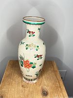 Full view of porcelain vase showing decoration and shape