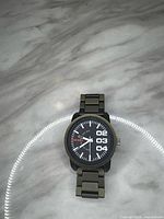 Front view showing dial design and bracelet