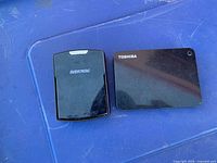 Top view showing Rayovac and Toshiba branded hard drives