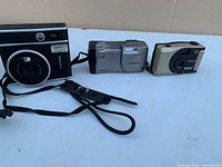 All three cameras laid out side by side