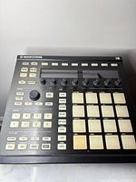 Top view of Maschine MK2 showing pads, knobs, buttons, displays