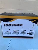 Retail box front displaying binding machine images and specifications