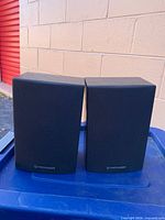 Front view of both Pioneer speakers with grilles