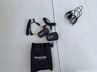 Full set with two modules, two cables, lav mic, pouch