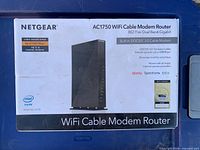 Retail box showing Netgear AC1750 WiFi Cable Modem Router C6300 specifications