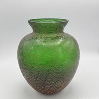 Front view of green crackle art glass vase