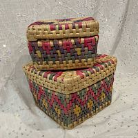 Two baskets with lids on