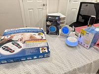 Overview of all three boxed units and powered-on devices on tabletop