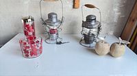 Full lot view showing both lanterns, maple leaf glassware and wooden apples