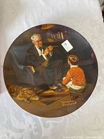 Front view of Norman Rockwell "The Tycoon" plate
