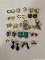 All 15 pairs laid out showing front view and relative sizes