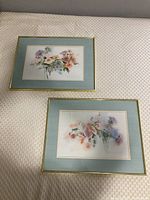 Both framed floral watercolour prints side by side