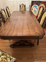 top view of dining table and chairs around it