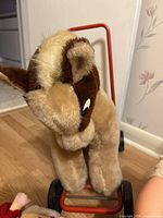 Plush pull-along horse on wheels