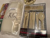 Vacuum bags, plastic flatware set in basket