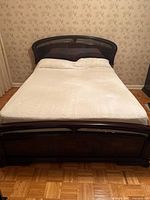 Full view of queen bed frame with mattress
