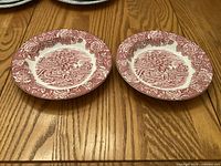 Two 9" red transferware rimmed soup bowls