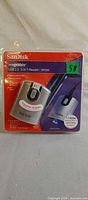 Front view of sealed SanDisk ImageMate USB 2.0 5-in-1 Reader/Writer package