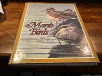 Front cover of hardcover book with dust jacket showing title and authors