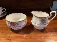 Front view of Royal Albert Petit Point creamer and sugar bowl