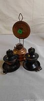 All three oil lamp bases grouped