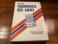 Front cover showing title, crest, stripes