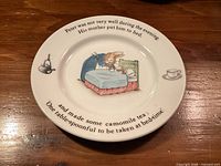 Top view of Wedgwood Peter Rabbit plate showing illustration and text