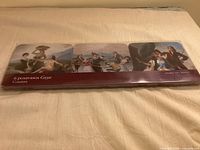 Front of sealed package showing four of the Goya coasters and branding