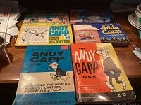 Six Andy Capp books front covers displayed