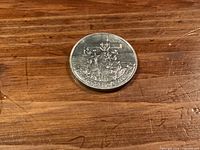 Reverse of 1984 Canadian commemorative dollar showing Jacques Cartier design