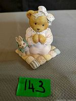 Front view of Cherished Teddies Patrice figurine showing bear, quilt base, rabbit companion
