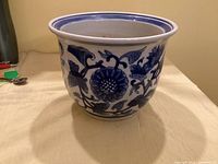 Front view showing floral decoration and shape