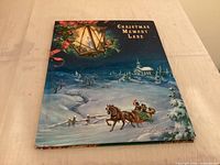 Front cover of Christmas Memory Lane hardcover book by Ideals