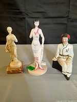 Front view of all three figurines