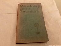 Front cover of gardening book showing title, author name, illustration and aging