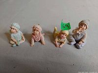 Front view of the four Faerietots figurines