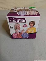 Front of sealed box showing product name and age rating