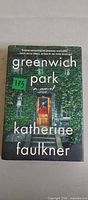 Front cover of Greenwich Park hardcover novel showing title, author and dust jacket art