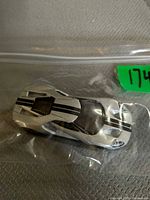 Top view of Hot Wheels 2017 Ford GT showing silver paint and black stripes