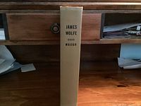 Spine showing title, author, beige cloth