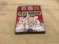 Front view of Let Me Through sliding puzzle showing artwork and title