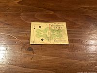 Front of 1939 Macdonald’s Tobacco promotional card #15 showing 2 of Spades design and advertising text