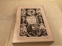 Front of slipcase showing illustrated cover with portrait and element symbols