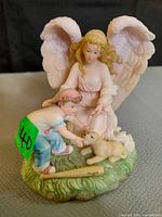 Front view of Seraphim Classics Angels to Watch Over Me figurine showing angel, boy, puppy and bat
