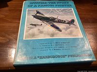 Front cover showing title, authorship, publisher statement, and Spitfire artwork