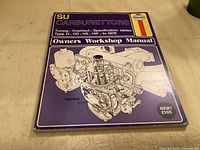 Front cover of Haynes SU Carburettors manual showing title, illustration and branding