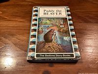 Front cover of book showing title, author and illustration