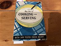 Front cover of 1937 Crisco cookbook "The Art of Cooking and Serving"