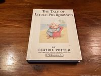 Front cover of book showing title, author, publisher and illustration